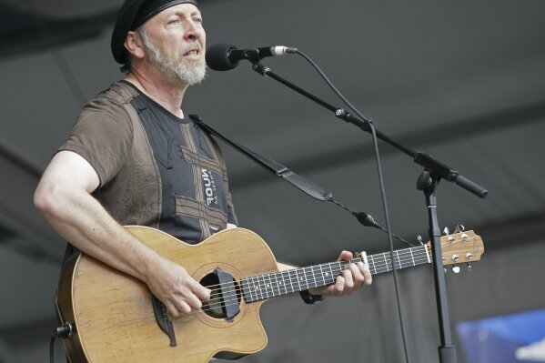 FILE - Richard Thompson performs during the 2008 New Orleans Jazz & Heritage Festival at the New Orleans Fairgrounds Racetrack in New Orleans, on May 2, 2008. Thompson's book "Beeswing: Losing My Way and Finding My Voice 1967–1975" released on April 6. (AP Photo/Dave Martin, File)