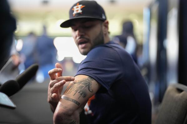Houston Astros starting pitcher Lance McCullers Jr. displays his tattoos ahead of Game 1 of the baseball World Series between the Houston Astros and the Philadelphia Phillies on Thursday, Oct. 27, 2022, in Houston. Game 1 of the series starts Friday. (AP Photo/David J. Phillip)