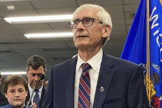 FILE - Democratic Wisconsin Gov. Tony Evers speaks at Cumberland Elementary School, Thursday, July 8, 2021, in Whitefish Bay, Wis. Evers on Thursday, March 21, 2024, has vetoed Republican proposals that would have allowed election observers to get closer to poll workers and required a new post-election audit. (AP Photo/Scott Bauer, File)