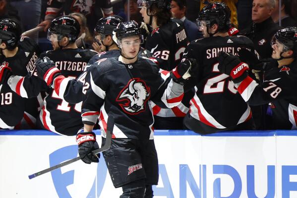 Buffalo Sabres right wing Jack Quinn (22) celebrates his goal during the second period of an NHL hockey game against the San Jose Sharks, Sunday, Dec. 4, 2022, in Buffalo, N.Y. (AP Photo/Jeffrey T. Barnes)