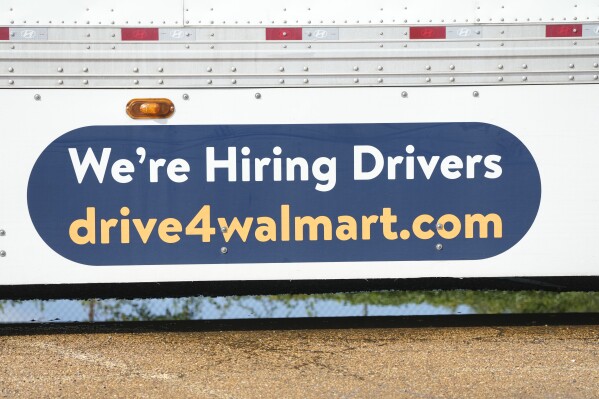An ad for drivers is displayed on a Walmart truck in Richland, Miss., Wednesday, Sept. 6, 2023. On Thursday, the Labor Department reports on the number of people who applied for unemployment benefits last week. (AP Photo/Rogelio V. Solis)