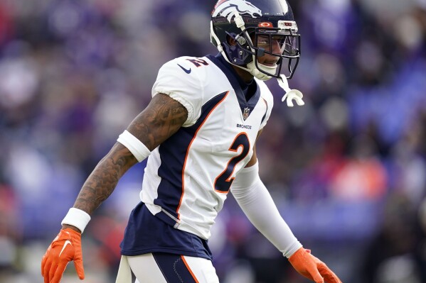 FILE - Denver Broncos cornerback Pat Surtain II defends in the first half of an NFL football game against the Baltimore Ravens, Dec. 4, 2022, in Baltimore. A first-round pick in 2021, Surtain lived up to his top-10 draft status with an All-Pro sophomore season. (AP Photo/Patrick Semansky, File)