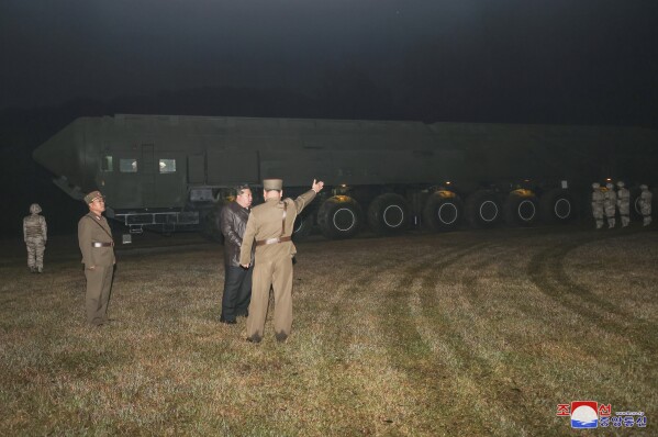 In this photo provided by the North Korean government, North Korean leader Kim Jong Un, second right, observes what it says a test launch of new intercontinental ballistic missile "Hwasong-19" at an undisclosed place in North Korea Thursday, Oct. 31, 2024. Independent journalists were not given access to cover the event depicted in this image distributed by the North Korean government. The content of this image is as provided and cannot be independently verified. Korean language watermark on image as provided by source reads: "KCNA" which is the abbreviation for Korean Central News Agency. (Korean Central News Agency/Korea News Service via AP)