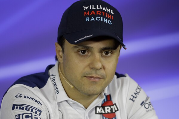 FILE - Williams driver Felipe Massa, of Brazil, attends a press conference at the Interlagos racetrack, in Sao Paulo, Brazil, Nov. 9, 2017. (AP Photo/Andre Penner, File)