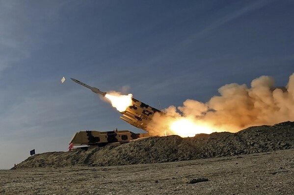FILE - In this photo released by the Iranian Army on Friday, Jan. 19, 2024, a missile is launched during a military drill in southern Iran. (Iranian Army via AP, File)