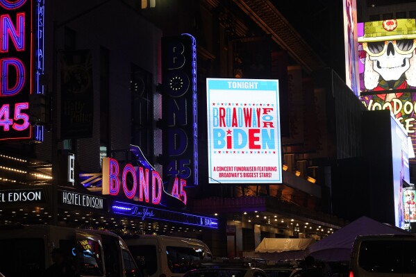 A marquee promoting a fundraiser with President Joe Biden is on display outside the Lunt-Fontanne Theatre in New York, Monday, Sept. 18, 2023. (AP Photo/Susan Walsh)