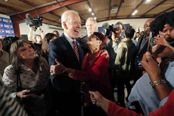 Democratic presidential candidate, former Vice President Joe Biden, greets supporters at a campaign event in Columbia, S.C., Tuesday, Feb. 11, 2020. (AP Photo/Gerald Herbert)