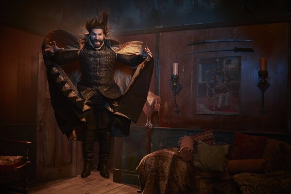 This image released by FX shows Kayvan Novak as Nandor in a scene from the comedy "What We Do in the Shadows." “The Queen’s Gambit,” “Lovecraft Country” and “What We Do in the Shadows” are among the series featured in a virtual edition of the Paley Center’s annual festival. The event celebrates TV programs and their stars and producers. (Matthias Clamer/FX via AP)