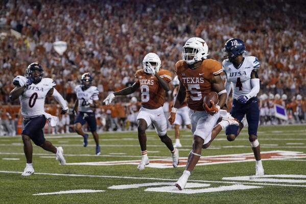 Texas running back Bijan Robinson (5) runs for a 78-yard touchdown against UTSA during the second half of an NCAA college football game, Saturday, Sept. 17, 2022, in Austin, Texas. (AP Photo/Eric Gay)