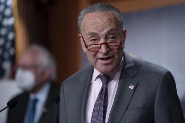 Senate Majority Leader Chuck Schumer, D-N.Y., meets with reporters during a news conference at the Capitol in Washington, Wednesday, March 1, 2023. President Joe Biden will meet with Senate Democrats Thursday to discuss the budget. (AP Photo/J. Scott Applewhite)