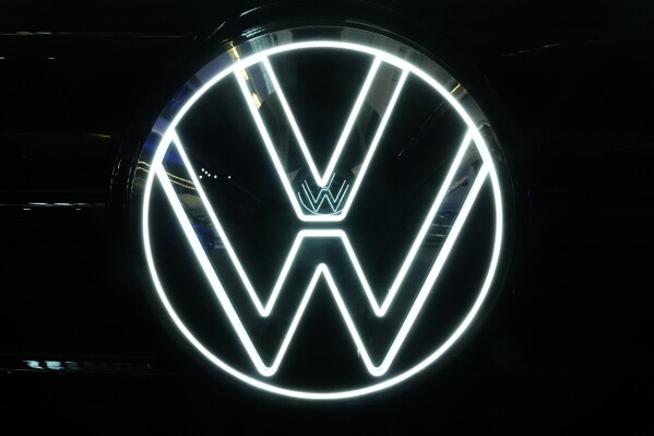 This is the Volkswagen logo on a Volkswagen automobile on display at the Pittsburgh International Auto Show in Pittsburgh, Feb. 15, 2024. Volkswagen is recalling more than 261,000 cars in the U.S. to fix a potential fuel leak that can increase the risk of fires. The recall covers certain Audi A3s and VW Golfs and GTIs from the 2015 through 2020 model years. Also included are 2015 through 2019 Golf Sportwagens, and 2019 and 2020 VW Jettas. (AP Photo/Gene J. Puskar)