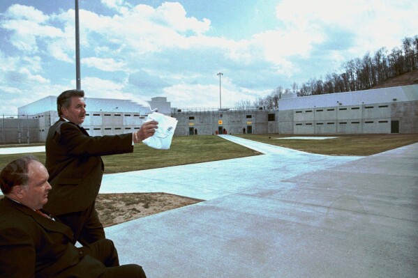 Virginia Lt. Gov. John Hager gets a tour April 9, 1999, of the new Wallens Ridge State Prison from Department of Corrections Director Ron Angelone in Big Stone Gap, Va. (Tan Van Le/Bristol Herald Courier via AP, file)