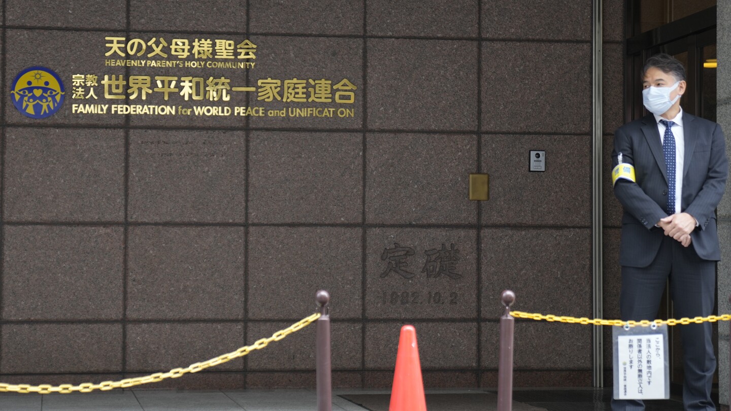 What is the Unification Church and why did a Japanese court order it dissolved?