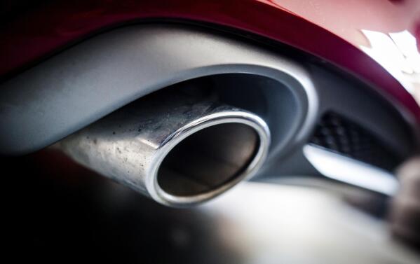 FILE - The exhaust pipe of an Audi A7 Sportback 3.0 TDI quattro, V6 diesel engine, in Backnang, Germany, Friday, June 2, 2017. The European Parliament and EU member countries have reached a deal to ban the sale of new gasoline and diesel cars and vans by 2035. EU negotiators sealed on Thursday, Oct. 27, 2022, the first agreement of the bloc’s “Fit for 55” package set up by the Commission to achieve the EU’s climate goals of cutting emissions of the gases that cause global warming by 55% over this decade. (Christoph Schmidt/dpa via AP, File)
