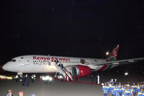 FILE - Kenya Airways Boeing 787 Dreamliner is parked on runway at Jomo Kenyatta International airport, Nairobi, Kenya, Sunday, Oct. 28, 2018, to commence its first non-stop flight, direct to New York City Sunday from the Jomo Kenyatta International Airport, Nairobi, Kenya.  The airline that flew a load of monkeys to the U.S. who were later involved in a highway wreck says it will stop this shipments this month. Kenya Airways says it will not renew its contract with the monkey provider, whom it did not identify.   On Jan. 21, 2022 a truck towing a trailer with the monkeys in crates collided with a dump truck on a Pennsylvania highway. Several escaped, and authorities said three had to be euthanized.(AP Photo/Sayyid Abdul Azim)