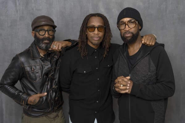 D'Wayne Wiggins, from left, Raphael Saadiq and Timothy Christian Riley of Tony! Toni! Tone! pose for a portrait on Wednesday, Sept. 27, 2023, in New York. The group kicked off a tour last month, their first featuring the three original members in 25 years. (AP Photo/Gary Gerard Hamilton)