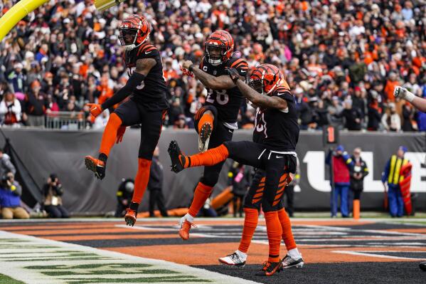 Cincinnati, United States. 26th Dec, 2021. Cincinnati Bengals wide receiver  Tyler Boyd (83) celebrates his touchdown against Baltimore Ravens with Joe  Mixon (28) during the first half of play at Paul Brown