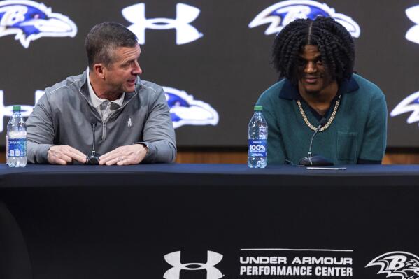 Baltimore Ravens head coach John Harbaugh and quarterback Lamar Jackson speak during a news conference at the NFL football team's training center, Thursday, May 4, 2023, in Owings Mills, Md. (AP Photo/Julia Nikhinson)