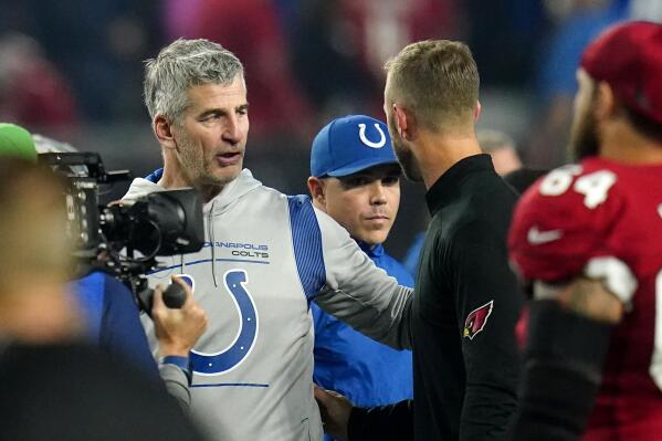 Indianapolis Colts head coach Frank Reich, left, greets Arizona Cardinals head coach Kliff Kingsbury after an NFL football game, Saturday, Dec. 25, 2021, in Glendale, Ariz. The Colts won 22-16. (AP Photo/Ross D. Franklin)