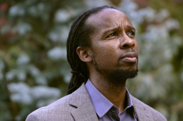 FILE - In this Oct. 21, 2020, file photo, Ibram X. Kendi, director of Boston University's Center for Antiracist Research, stands for a portrait in Boston. Boston University said Tuesday, Nov. 7, 2023 that its initial inquiry into the antiracist research center run by Kendi found no issues with how it managed its finances. The university launched the inquiry into the financials of the BU Center for Antiracist Research in September, after acknowledging the organization was laying off a number of its staff and changing its operating model. (AP Photo/Steven Senne, File)