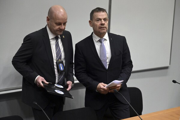 Detective Superintendent Risto Lohi, left, and Director of the National Bureau of Investigation NBI of Finland Robin Lardot attend a press conferance in Vantaa, Finland, Wednesday Oct. 11, 2023. NBI is investigating the Batic connector gas pipeline leak and adjacent data cable damage because of "external activity". (Jussi Nukari/Lehtikuva via AP)