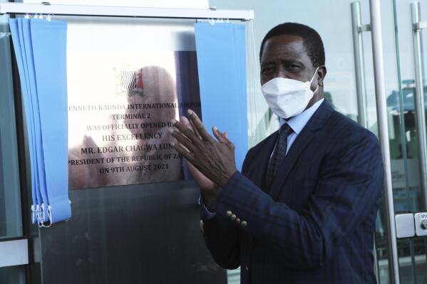 Zambian President Edgar Lungu is seen after officially opening a terminal at the Kenneth Kaunda International airport in Lusaka, Zambia, Monday, Aug, 9, 2021. Zambia's standing as one of Africa's most stable democracies is threatened by the vote this week, in which incumbent Lungu is seeking re-election. A tight race is expected against frequent opposition candidate Hakainde Hichilima and some analysts say the presidential election will be a stern test for Zambia no matter who wins. (AP Photo/Tsvangirayi Mukwazhi)