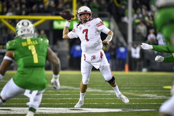 Utah quarterback Cameron Rising (7) passes the ball again Oregon during the first half of an NCAA college football game Saturday, Nov. 19, 2022, in Eugene, Ore. (AP Photo/Andy Nelson)
