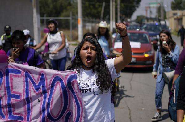 FILE - Roxana Ruiz shouts slogans during a march in memory of Diana Velazquez, who was making a call outside her home in 2017 when she was disappeared, raped and killed, in Chimalhuacan, State of Mexico, Mexico, July 2, 2022. Ruiz, who killed a man defending herself when he attacked and raped her in 2021 was sentenced to more than six years in prison, a decision her legal defense called “discriminatory” and vowed to appeal Tuesday, May 16, 2023.(AP Photo/Eduardo Verdugo, File)