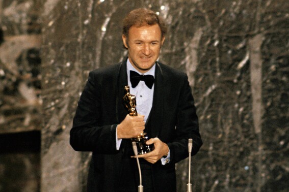 Gene Hackman accepts his Oscar for best actor at the 44th Academy Awards in Los Angeles on April 10, 1972. (AP Photo, File)
