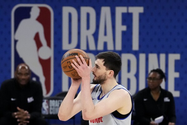 Team St. Andrews' Alex Karaban shoots a free throw during the 2024 NBA Draft Combine 5-on-5 basketball game against Team Love in Chicago, Wednesday, May 15, 2024. (AP Photo/Nam Y. Huh)