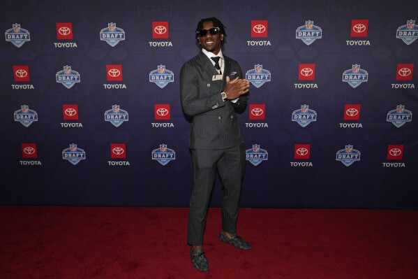 LSU wide receiver Malik Nabers poses on the red carpet ahead of the first round of the NFL football draft, Thursday, April 25, 2024, in Detroit. (AP Photo/Carlos Osorio)