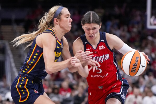 Atkins scores 26 for the Mystics, who overcome Caitlin Clark's 29 points to  beat the Fever 89-84 | AP News