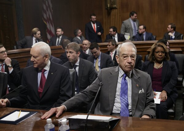 
              Senate Judiciary Committee Chairman Sen. Charles Grassley, R-Iowa, right, and Sen. Orrin Hatch, R-Utah, wait for the committee's ranking member, Sen. Dianne Feinstein, D-Calif. on Capitol Hill in Washington, Monday, March 27, 2017. Senate Democrats forced a one-week delay in a committee vote on President Donald Trump's Supreme Court nominee, who remains on track for confirmation with solid Republican backing.  (AP Photo/J. Scott Applewhite)
            