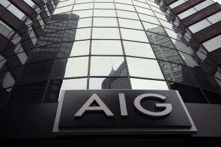 FILE - The American International Group logo at the company's headquarters in New York is pictured on Jan. 9, 2013. AIG said Wednesday, Dec. 14, 2022, that its Financial Products unit has filed for Chapter 11 bankruptcy protection. (AP Photo/Bebeto Matthews, File)