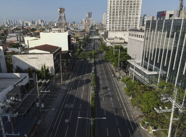 An almost empty Espana boulevard as the government implements a strict lockdown to prevent the spread of the coronavirus on Good Friday, April 2, 2021 in Manila, Philippines. Filipinos marked Jesus...