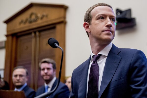 FILE - In this Wednesday, Oct. 23, 2019, file photo, Facebook CEO Mark Zuckerberg arrives for a House Financial Services Committee hearing on Capitol Hill in Washington, on Facebook's impact on the financial services and housing sectors. Ever since Russian agents and other opportunists abused its platform in an attempt to manipulate the 2016 U.S. presidential election, Facebook has insisted, repeatedly, that it’s learned its lesson and is no longer a conduit for misinformation, voter suppression and election disruption. (AP Photo/Andrew Harnik, File)