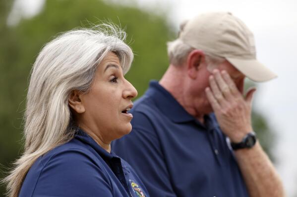 Joey and Paula Reed, parents of Trevor Reed, talk about his release during a news conference outside their Granbury, Texas, home, Wednesday, April 27, 2022. Russia and the United States carried out an unexpected prisoner exchange on Wednesday trading Reed, a Marine veteran jailed by Moscow, for a convicted Russian drug trafficker serving a long prison sentence in America. (Tom Fox/The Dallas Morning News via AP)