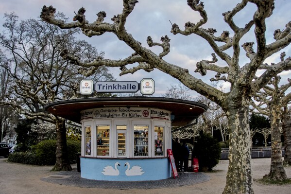 A former water house, a small shop that sprung up in the 19th century to encourage workers to drink affordable water rather than beer or schnapps, that is now a kiosk photographed in Frankfurt, Germany, on March 31, 2025. (AP Photo/Michael Probst)