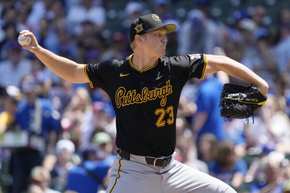 Pittsburgh Pirates starting pitcher Mitch Keller throws against the Chicago Cubs during the first inning of a baseball game in Chicago, Sunday, May 19, 2024. (AP Photo/Nam Y. Huh)