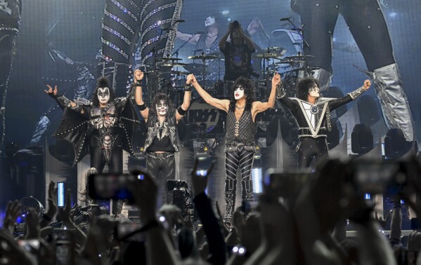 Gene Simmons, left, Eric Singer, Paul Stanley and Tommy Thayer of KISS take a bow during the final night of the "Kiss Farewell Tour," Saturday, Dec. 2, 2023, at Madison Square Garden in New York. (Photo by Evan Agostini/Invision/AP)