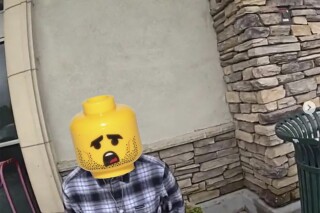 This image provided by Murrieta, Calif., Police Dept. shows an altered photo of a suspect used by the The Murrieta Police Department. The Southern California police department has been handcuffed by Lego after the Danish toy company asked the agency on March 19, 2024, to stop editing Lego heads over suspects' photos on social media. (Murrieta Police Dept. via AP)