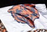 FILE - The Chicago Bears logo is pictured on a flag prior to an NFL football game between the Chicago Bears and Denver Broncos, Oct. 1, 2023, in Chicago. The Chicago Bears have scheduled a Wednesday, April 24, 2024, news conference to announce plans for “a state-of-the-art, publicly owned enclosed stadium” on the city's Museum Campus near Lake Michigan. The announcement Monday, April 22, said the plans also call for additional green and open space with access to the lakefront. (AP Photo/Kamil Krzaczynski, File)