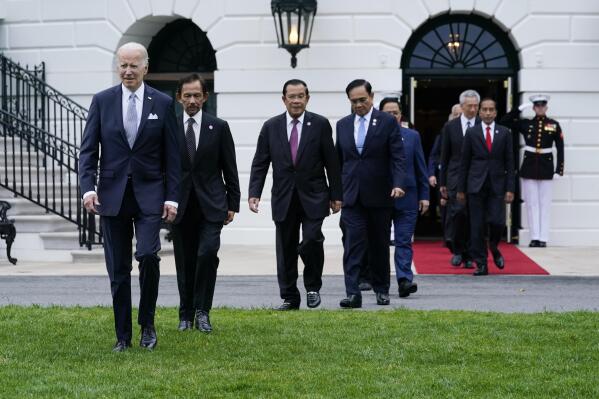President Joe Biden and leaders from the Association of Southeast Asian Nations (ASEAN) arrive for a group photo on the South Lawn of the White House in Washington, Thursday, May 12, 2022. (AP Photo/Susan Walsh)