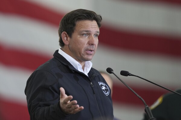 Florida Gov. Ron De Santis speaks during a press conference on immigration enforcement, at Homestead Air Force Base, Feb. 26, 2025, in Homestead, Fla. (AP Photo/Rebecca Blackwell, File)