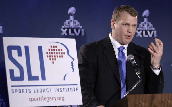 
              FILE - In this Feb. 3, 2012, file photo, Chris Nowinski, co-founder of the Sports Legacy Institute, talks about a hit count proposal to dramatically reduce youth athletes' exposure to repetitive brain trauma in multiple sports during a news conference at the Super Bowl XLVI media center in Indianapolis. After years of blows to the head, Nowinski developed symptoms of what is known generally as post-concussion syndrome: headaches, memory loss, sleep-walking. He, too, struggled to figure out what was wrong. In shuttling from doctor to doctor, he learned about CTE.  (AP Photo/David J. Phillip, File)
            