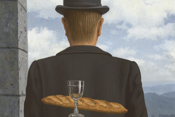 This photo released by Christie’s auction house on Saturday Feb. 3, 2024, shows “L’ami intime” (The Intimate Friend) by surrealist painter René Magritte. A major work by Magritte that hasn’t been shown in public for a quarter century could fetch 50 million pounds ($64 million) at auction next month. Christie’s auction house announced Saturday Feb. 3, 2024 that it will offer “L’ami intime” (The Intimate Friend) at a March 7 sale in London marking a century of the surrealist movement in art. (Christie's via AP)