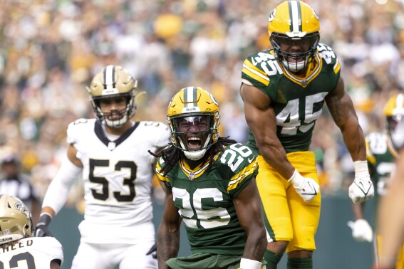 FILE - Green Bay Packers safety Darnell Savage (26) and linebacker Eric Wilson (45) react in the second half at Lambeau Field in Green Bay, Wis., Sunday, Sept. 24, 2023. Savage has been activated from injured reserve, clearing the way for his potential return from a five-game absence Sunday night against the Kansas City Chiefs. (Samantha Madar/Wisconsin State Journal via AP, File)