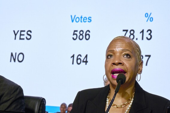 Bishop Tracy Smith Malone surveys the results of a delegate vote in favor of a worldwide regionalization plan as she presides over a legislative session of the 2024 United Methodist General Conference in Charlotte, N.C., on April 25, 2024. The proposal needed a two-third majority vote to pass. (Paul Jeffrey/UM News via AP)