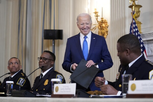President Joe Biden meets with law enforcement officials in the State Dining Room of the White House in Washington, Wednesday, Feb. 28, 2024. (AP Photo/Andrew Harnik)