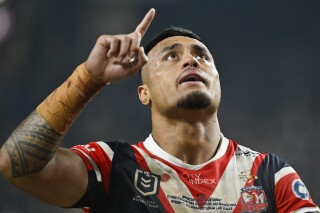 Roosters Spencer Leniu reacts during the NRL match between the Sydney Roosters and the Brisbane Broncos at Allegiant Stadium in Las Vegas, Saturday, March 2, 2024. (AP Photo/David Becker)